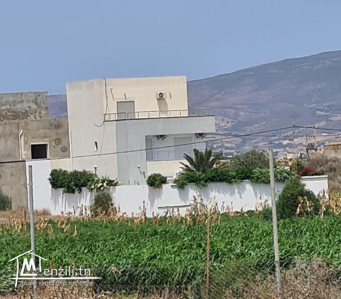 Un terrain de 675 m2 a vendre