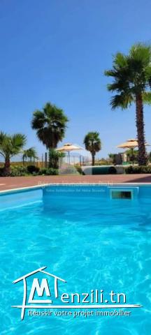 Appartement S2 au 5éme étage vue mer partiel pied dans l'eau à chatt meriem sousse par jour