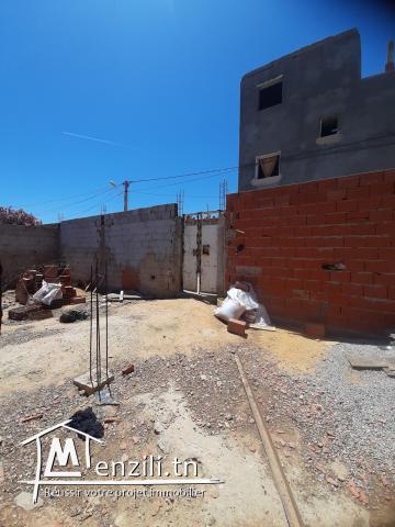 À vendre terrain + un petit studio + plan complet pour la construction de maison