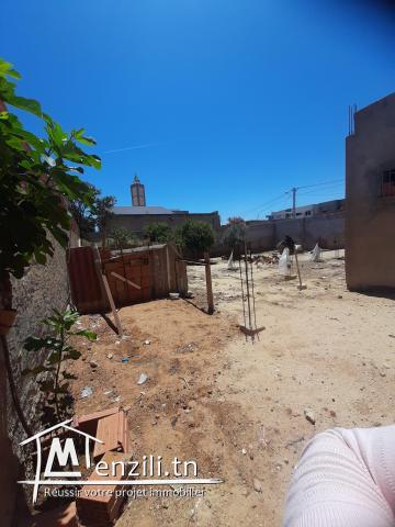 À vendre terrain + un petit studio + plan complet pour la construction de maison