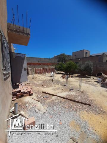 À vendre terrain + un petit studio + plan complet pour la construction de maison