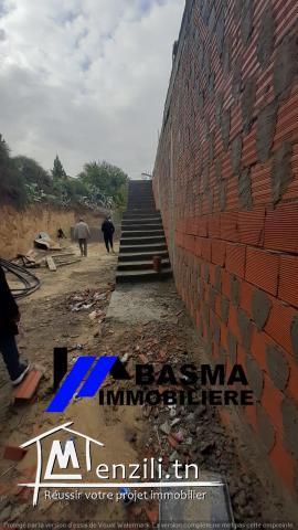 Une maison de compagne inachevée à vendre située à kalaa kbira