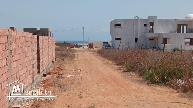 un terrain à dar allouche de  454 m²