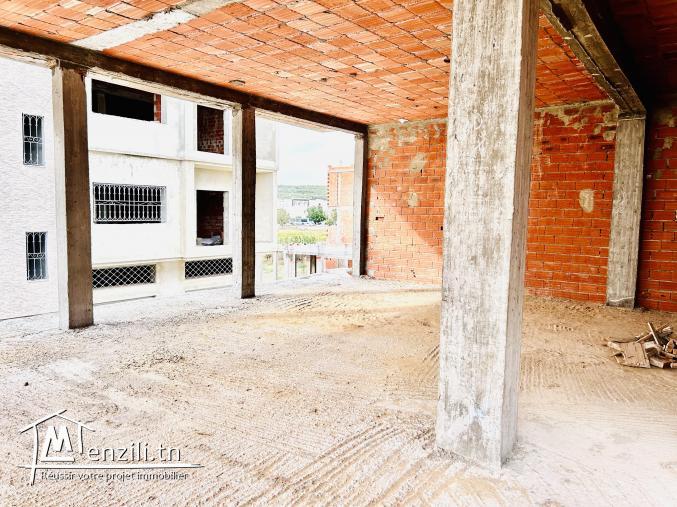 Maison inachevée projet immeuble