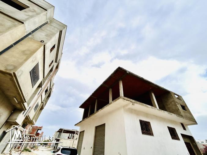 Maison inachevée projet immeuble