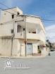 Deux maisons + deux garages de commerce