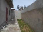 AV une belle maison avec jardin + garage  pas loin de yasmin hammamet   G