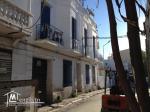 IMMEUBLE A BAB EL KHADRA A TUNIS. SE TROUVANT AU RUE DE SOUSSE PRES DE MECHTEL.