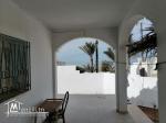 Maison au bord de la mer