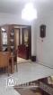 Salon et trois chambres