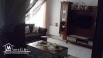 Salon et trois chambres