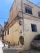 Une maison traditionnelle a VENDRE situé à la Madina