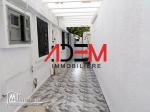 Maison  avec deux studios et un local commercial