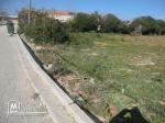 terrain  avendre sur la route goudronnée