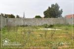 A VENDRE un beau terrain viabilisé et cloturé a la soukra 27246322