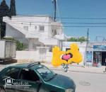 A vendre un terrain avec deux maisons et 3 locaux commerciaux