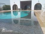 Villa pied dans l'eau avec piscine
