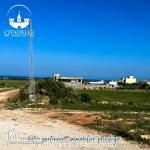 أرض مطلة على البحر و جبل الهوارية في كركوان