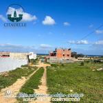 أرض مطلة على بحرفي دار علوش قليبية????