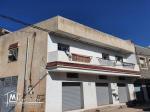 Appartement et garage commercial