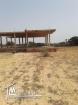 terrain de 875 M2 avec une maison en cours de construction