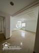 A vendre appartement s+2 spacieux avec place de parking sous sol à jardin de l'Aouina