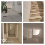 Grand étage de villa avec terrasse.