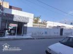 Maison + Boutique  A vendre