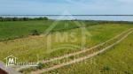 Terrain pieds dans l'eau avec 2 garages à Korba à vendre 51355351